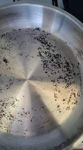 Black spots on stainless steel